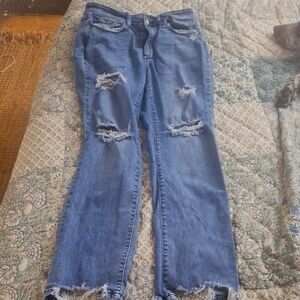 Distressed Blue Denim Jeans